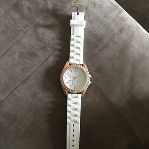 Rose Gold and White Rubber Watch.
